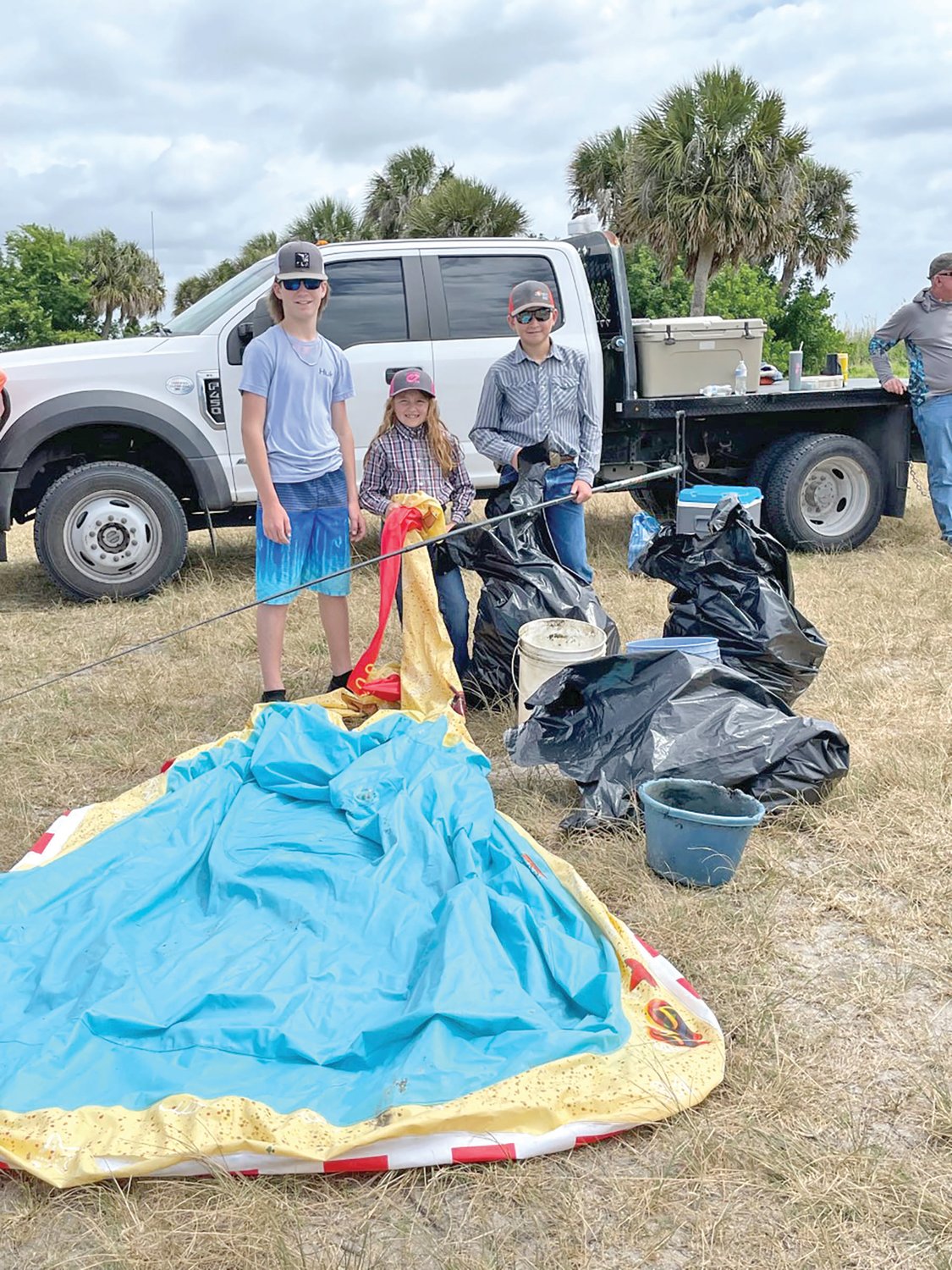 Second place winners of the Lake Okeechobee Cleanup were Blake McDonald, Avery Davis and Clayte Davis.
